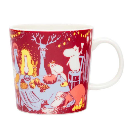 Moomin Festive Moments mug: the Moomins at a candlelit Christmas feast, in red