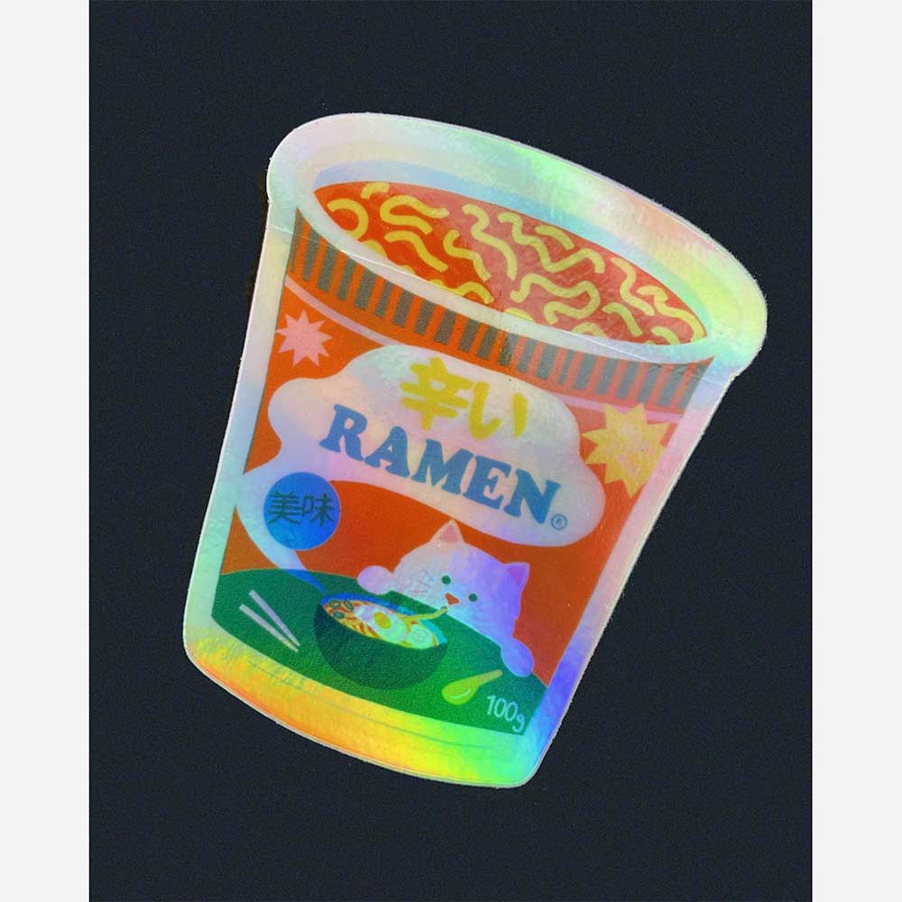 Close-up of the holographic ramen cup sticker
