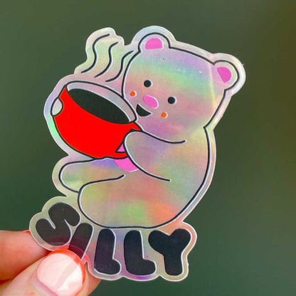 Close-up of the holographic Silly bear sticker
