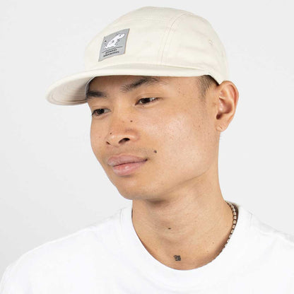 Man wearing the off-white Moomin cap