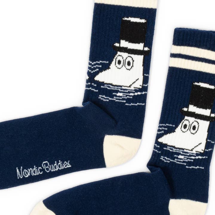 Close-up of Moominpappa in a top hat on the navy socks