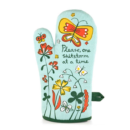 Mint green oven mitt with butterflies and flowers: Please, one shitstorm at a time