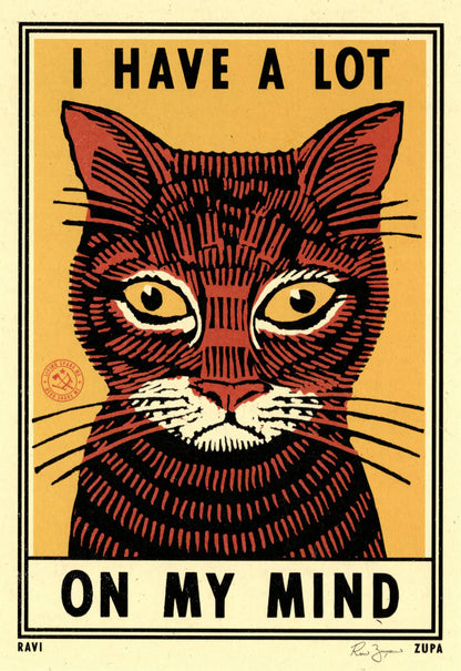 Ravi Zupa print: a tabby cat face with 'I have a lot on my mind'