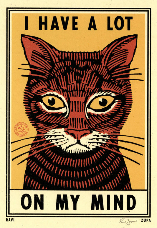 Ravi Zupa print: a tabby cat face with 'I have a lot on my mind'