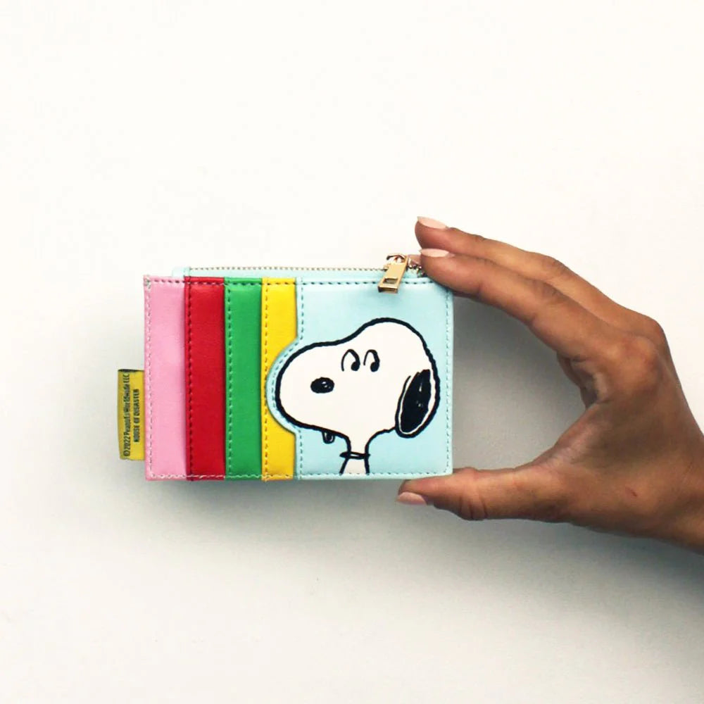 Back of the purse with card slots in pink, red, green and yellow and Snoopy's face
