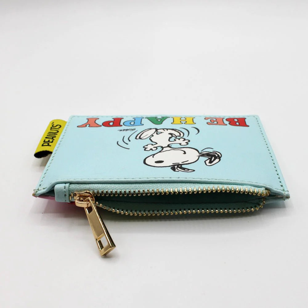 Purse unzipped, showing the gold zip and Peanuts tag