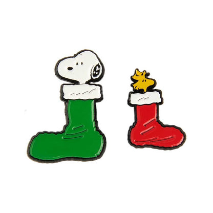 Snoopy and Woodstock stocking pins side by side