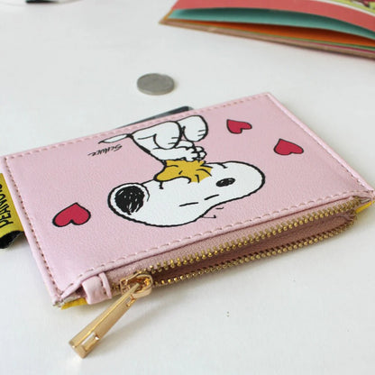 Close-up of the Peanuts Love purse and gold zip