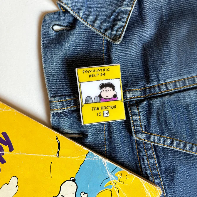 Lucy pin on a denim jacket