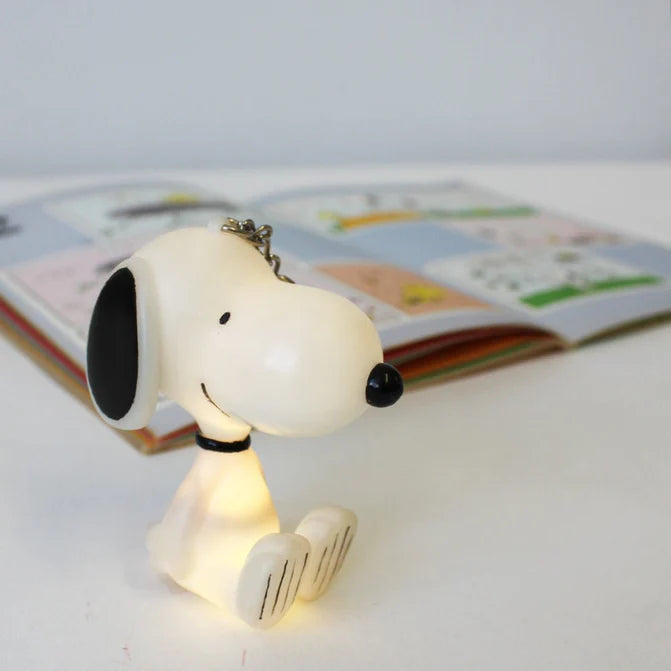 Snoopy light-up key ring glowing, front view