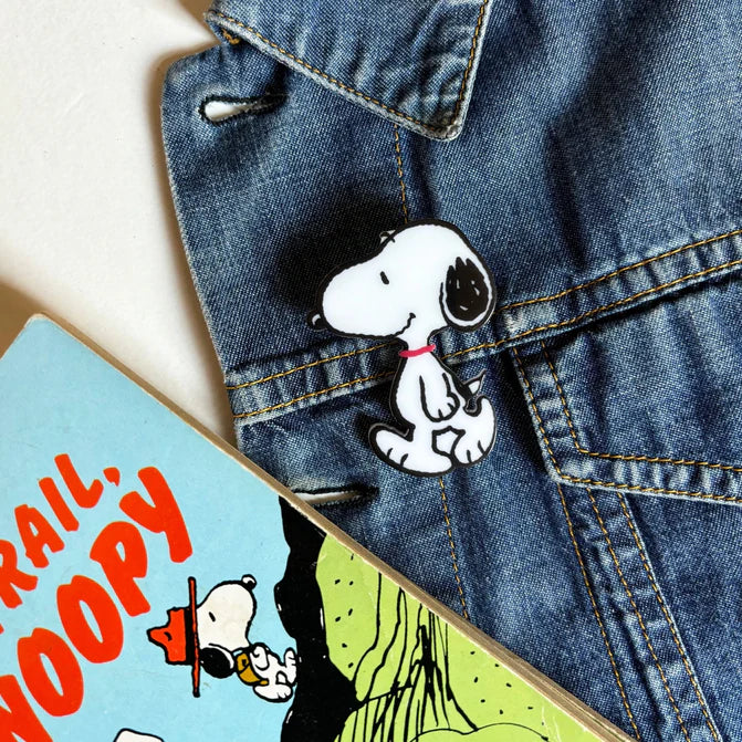 Peanuts acrylic Snoopy brooch on a denim jacket