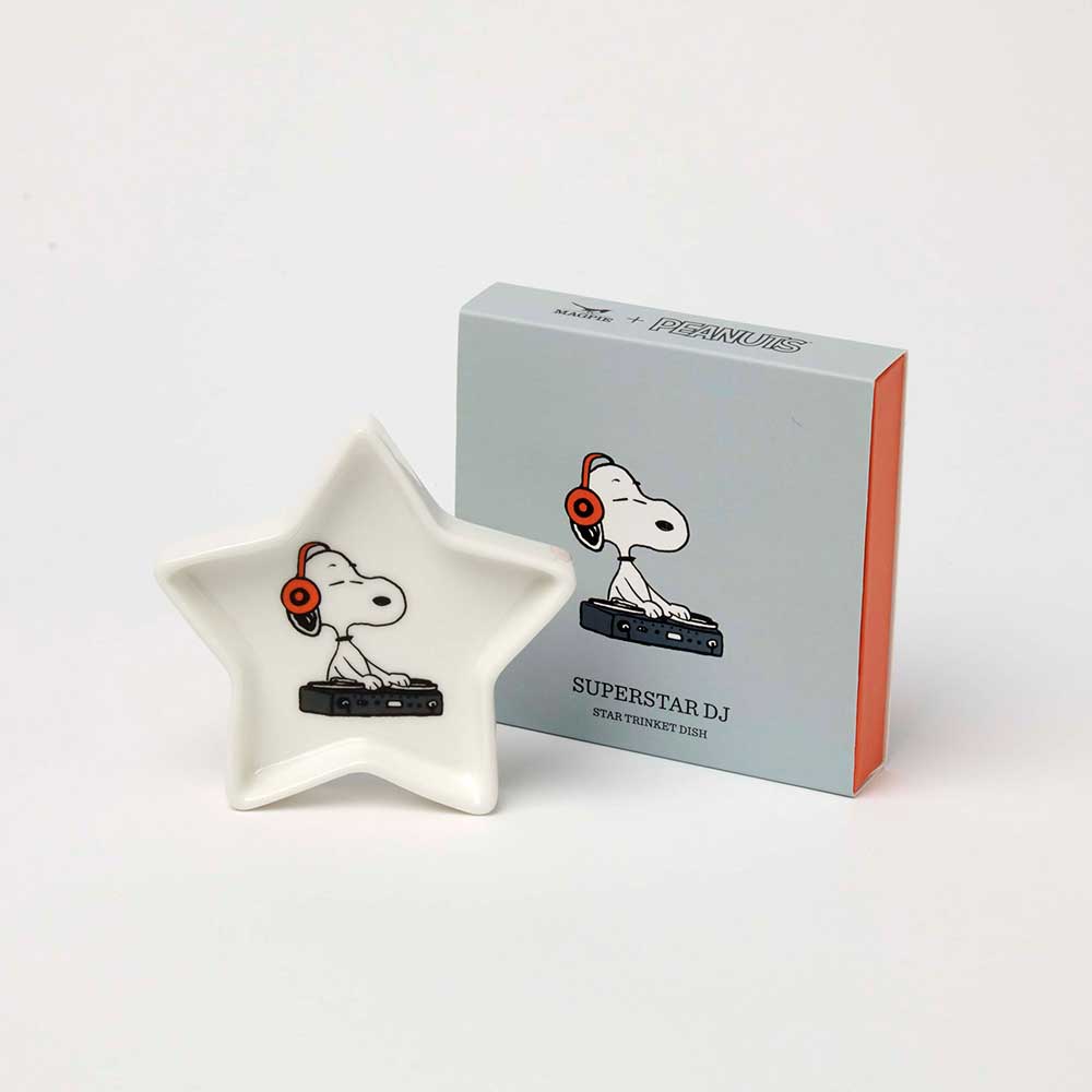 White star-shaped trinket dish with Snoopy as a DJ in headphones, beside its box