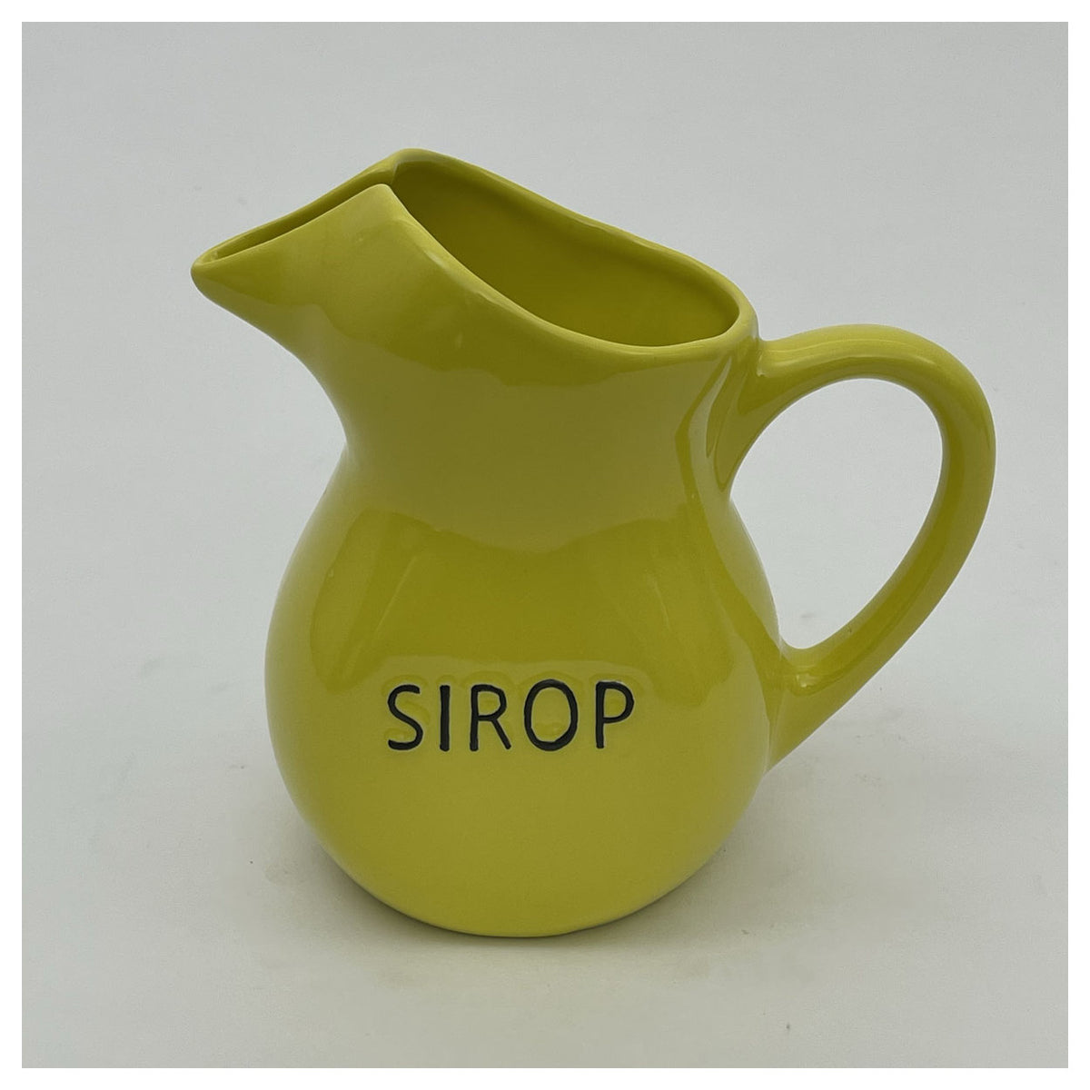 Bazardeluxe yellow ceramic jug with 'Sirop' written on the front