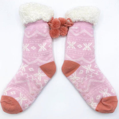 Pair of pink Moomin slipper socks laid flat
