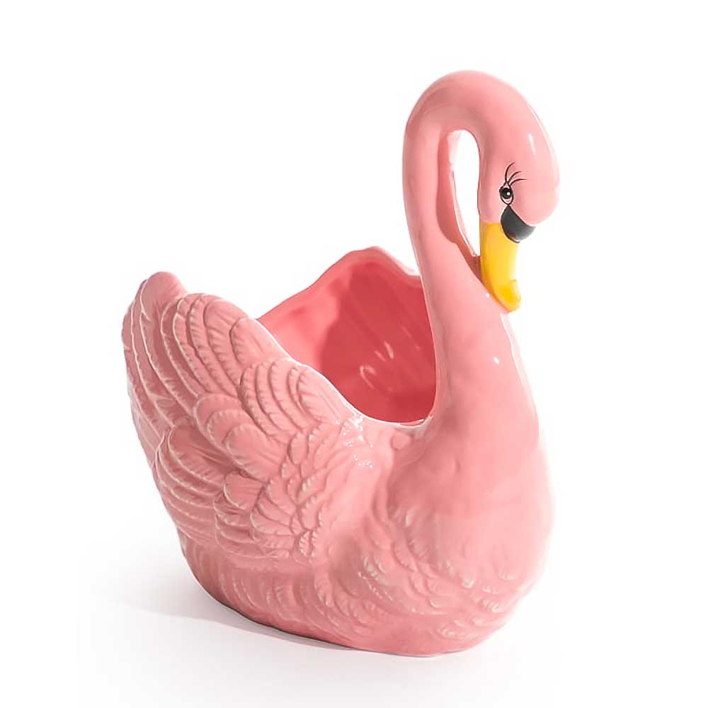 Pink ceramic swan planter with a yellow beak