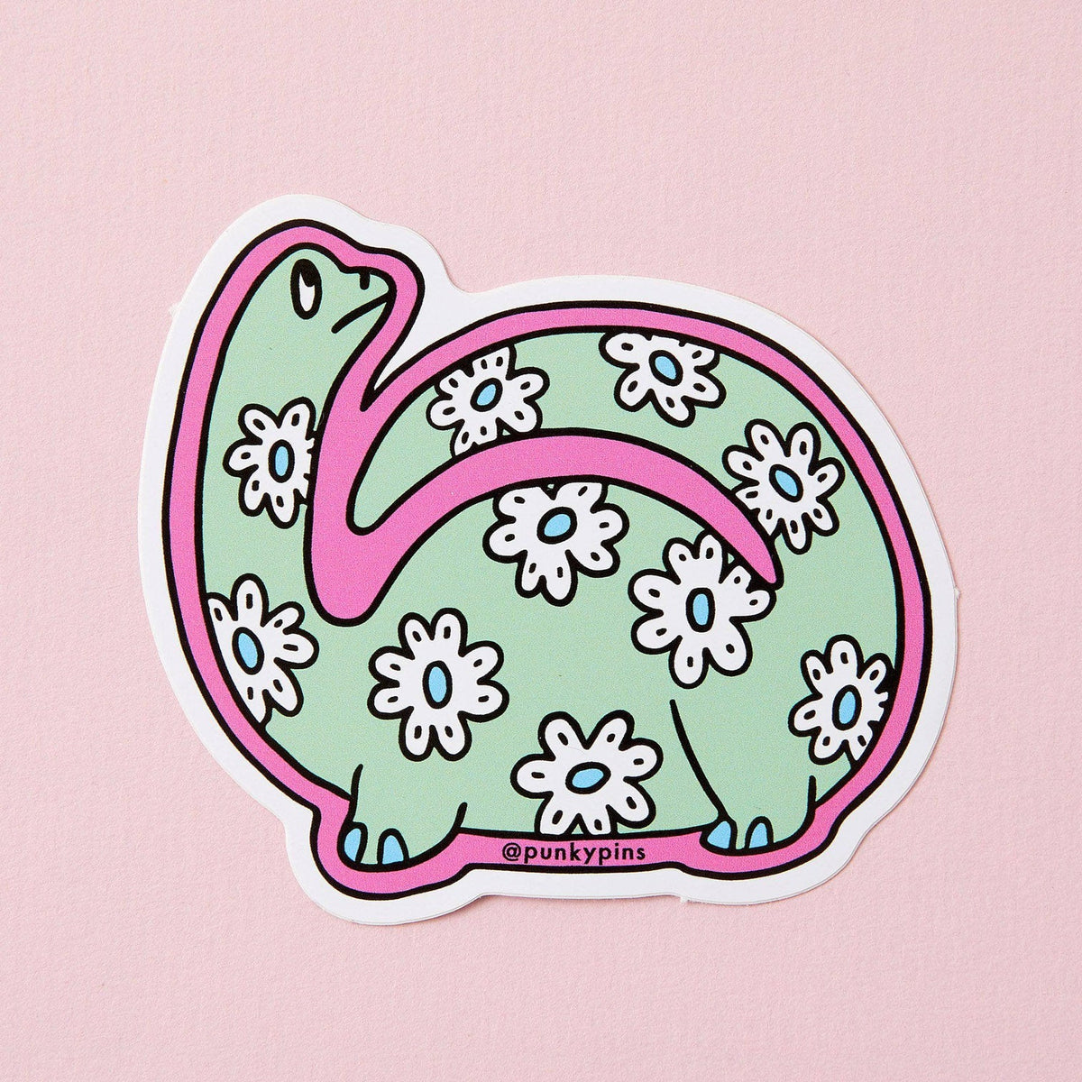 Mint dinosaur sticker covered in daisies