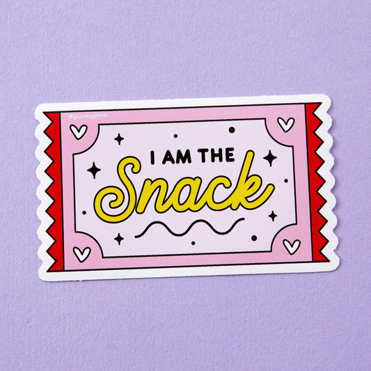 Punky Pins sticker shaped like a pink ticket reading 'I am the snack'