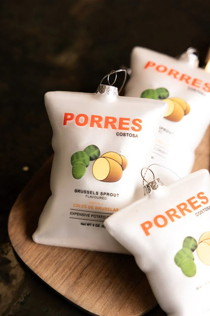 Several Porres crisp packet decorations on a wooden board