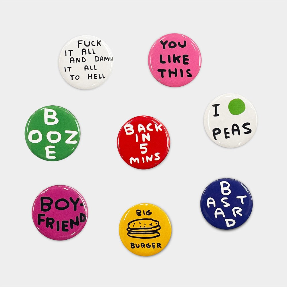 David Shrigley badge set: colourful badges like 'You like this', 'I peas', 'Booze' and 'Back in 5 mins'