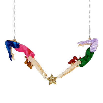 Tatty Devine aerial acrobat duo necklace: two trapeze artists holding a gold star