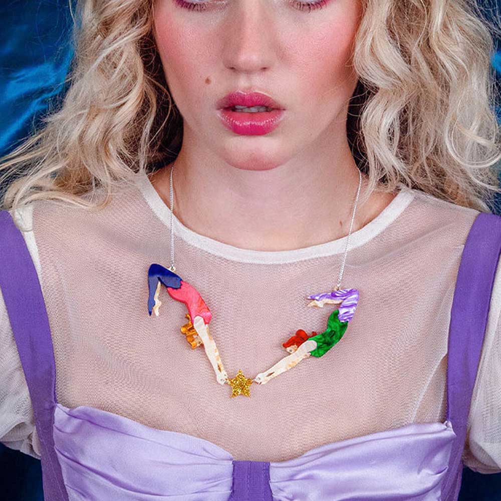 Woman wearing the aerial acrobat necklace