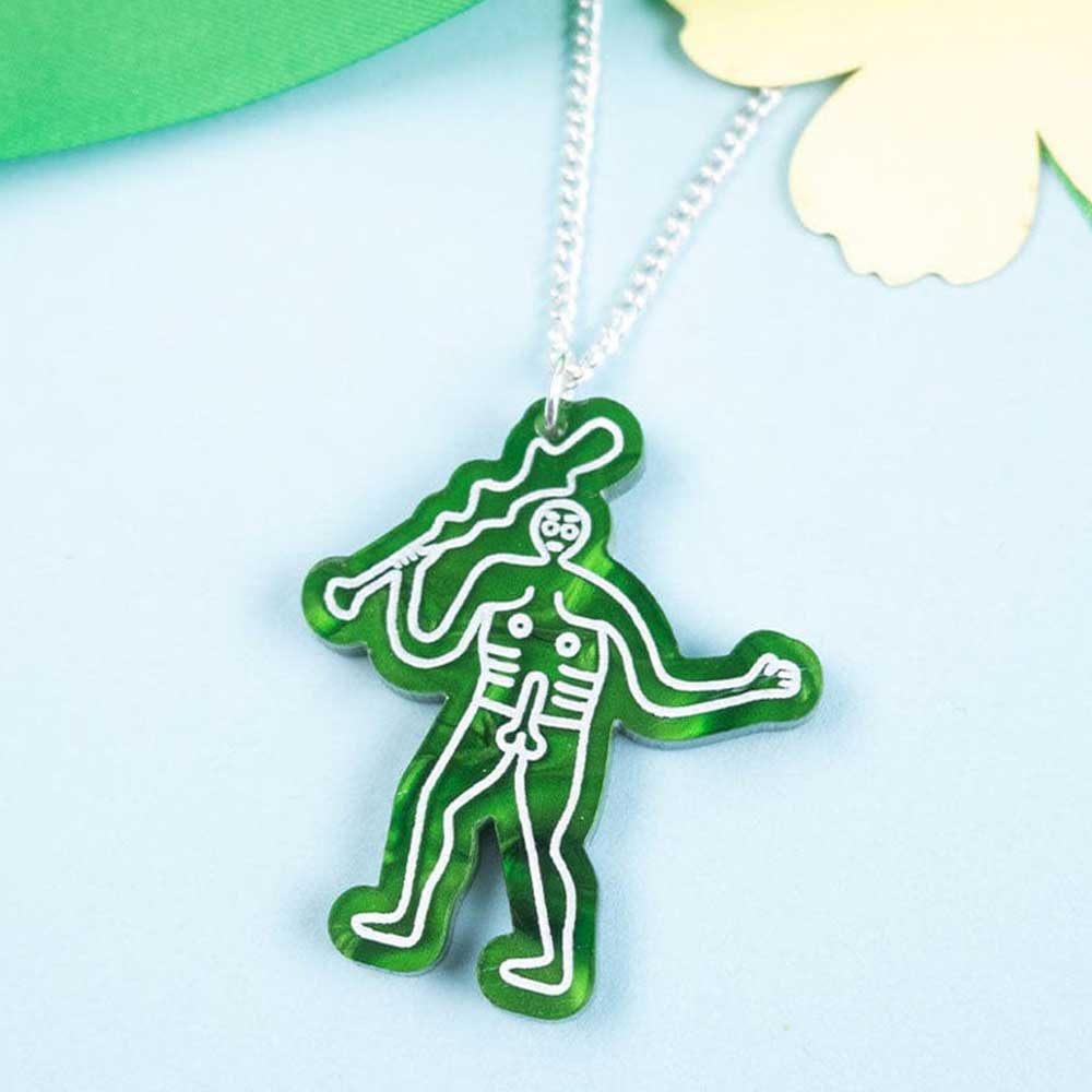 Cerne Abbas pendant against a blue background