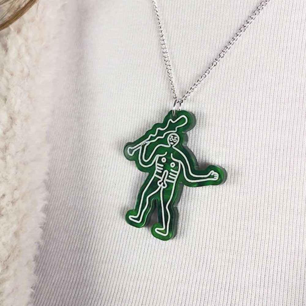 Cerne Abbas pendant worn on a cream jumper