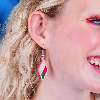 Laughing woman wearing a harlequin earring