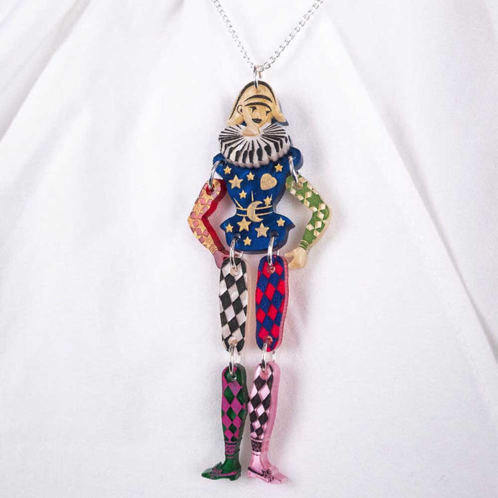 Harlequin pendant worn with a white top