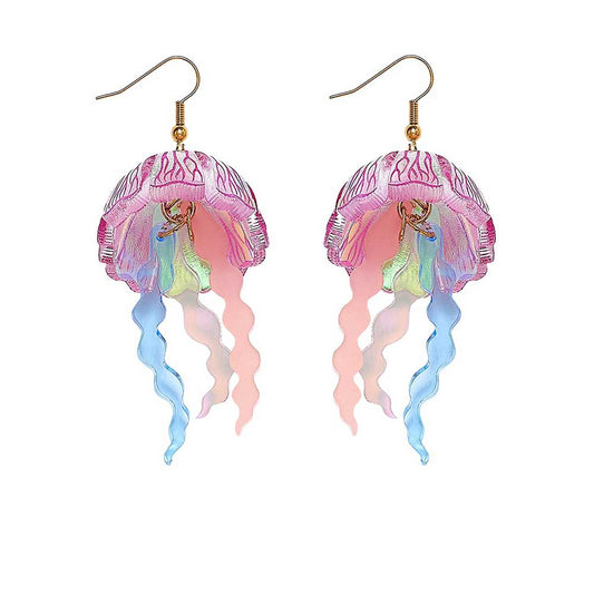 Tatty Devine moon jellyfish earrings in iridescent pink and blue
