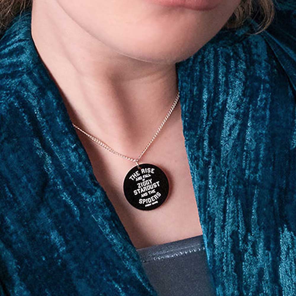 Spiders from Mars pendant worn with a teal velvet top