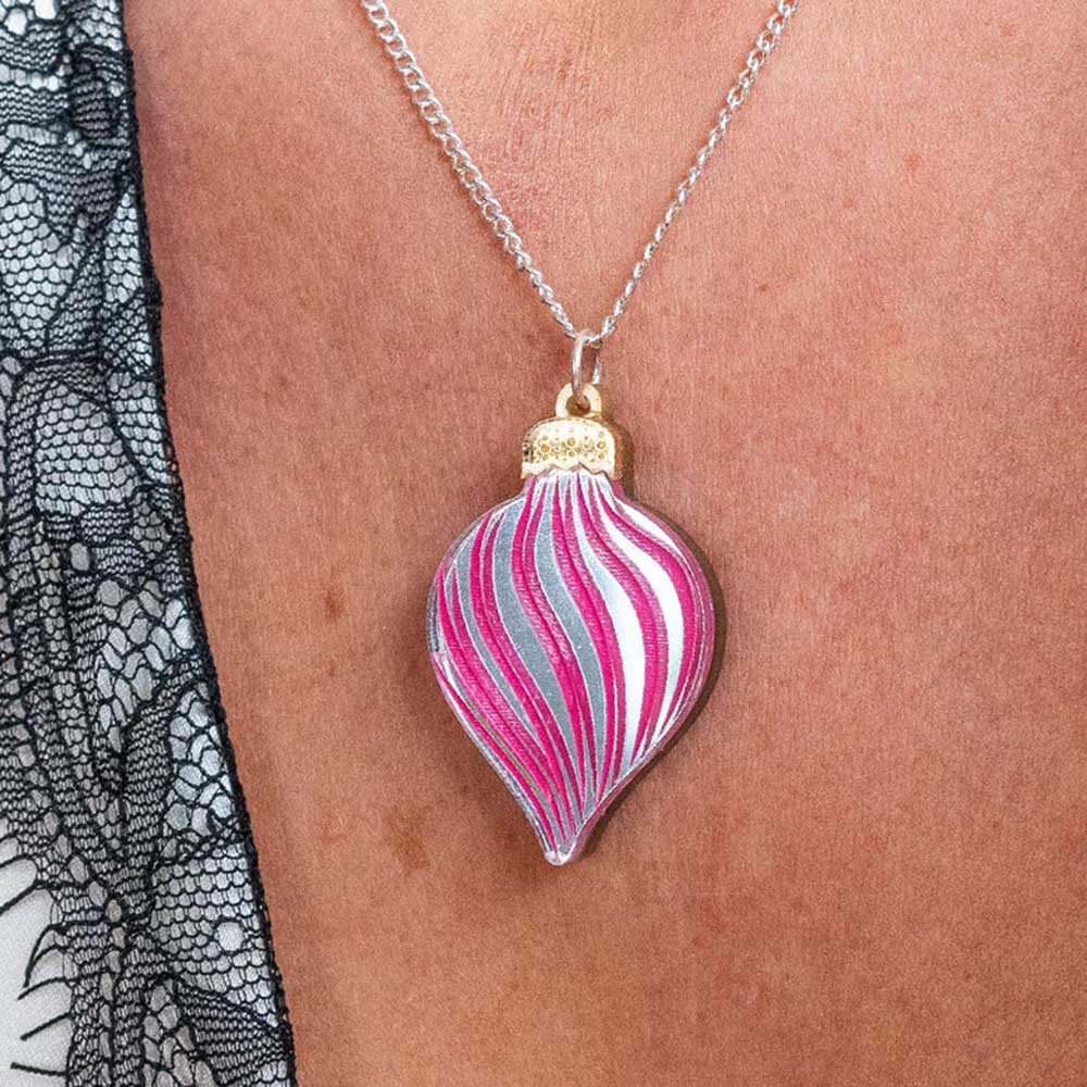 Vintage bauble pendant worn with black lace