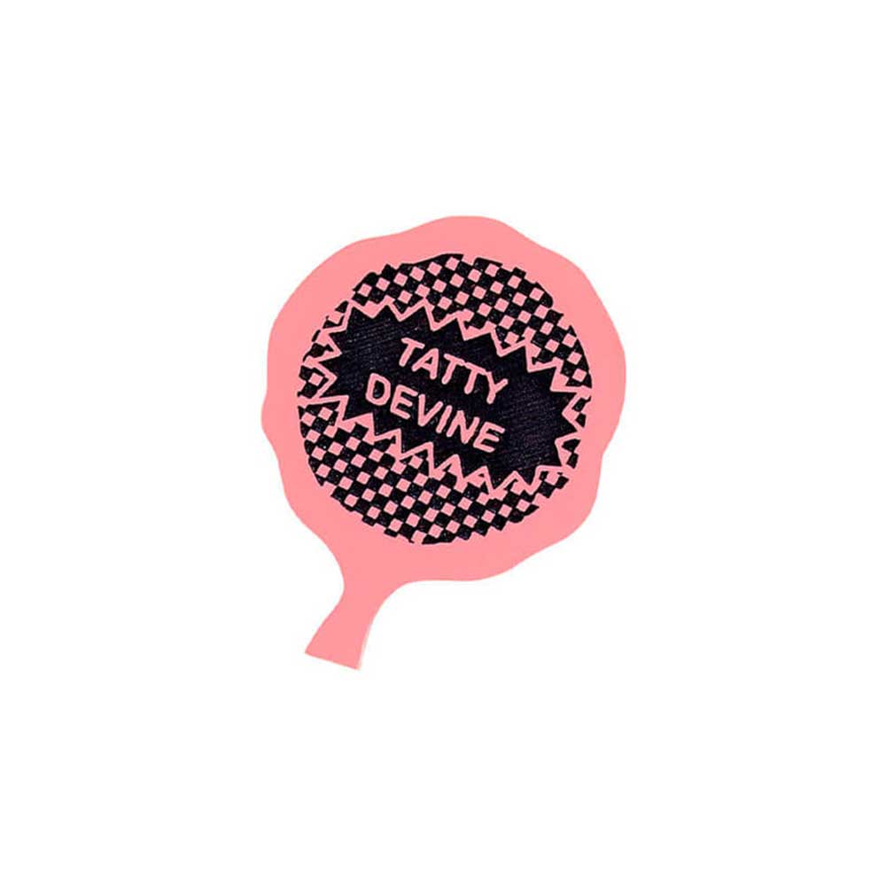 Tatty Devine whoopie cushion brooch reading 'Tatty Devine'