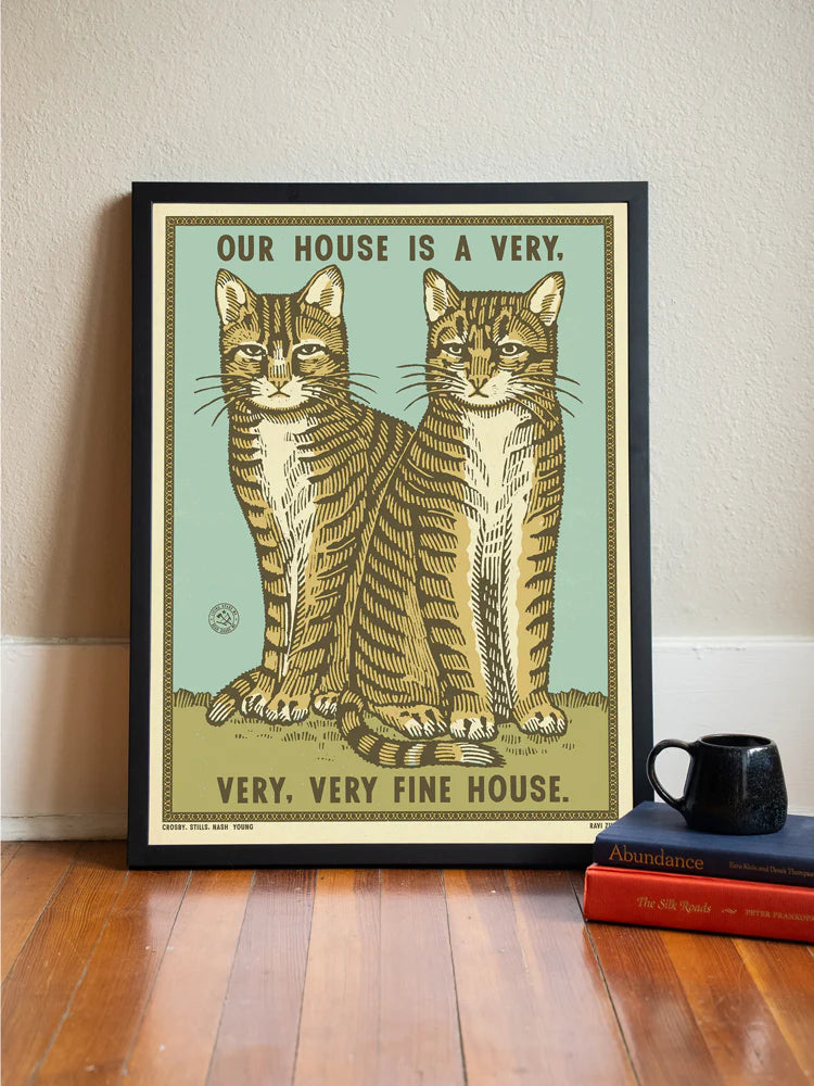 Very Fine House print in a frame on a wooden floor